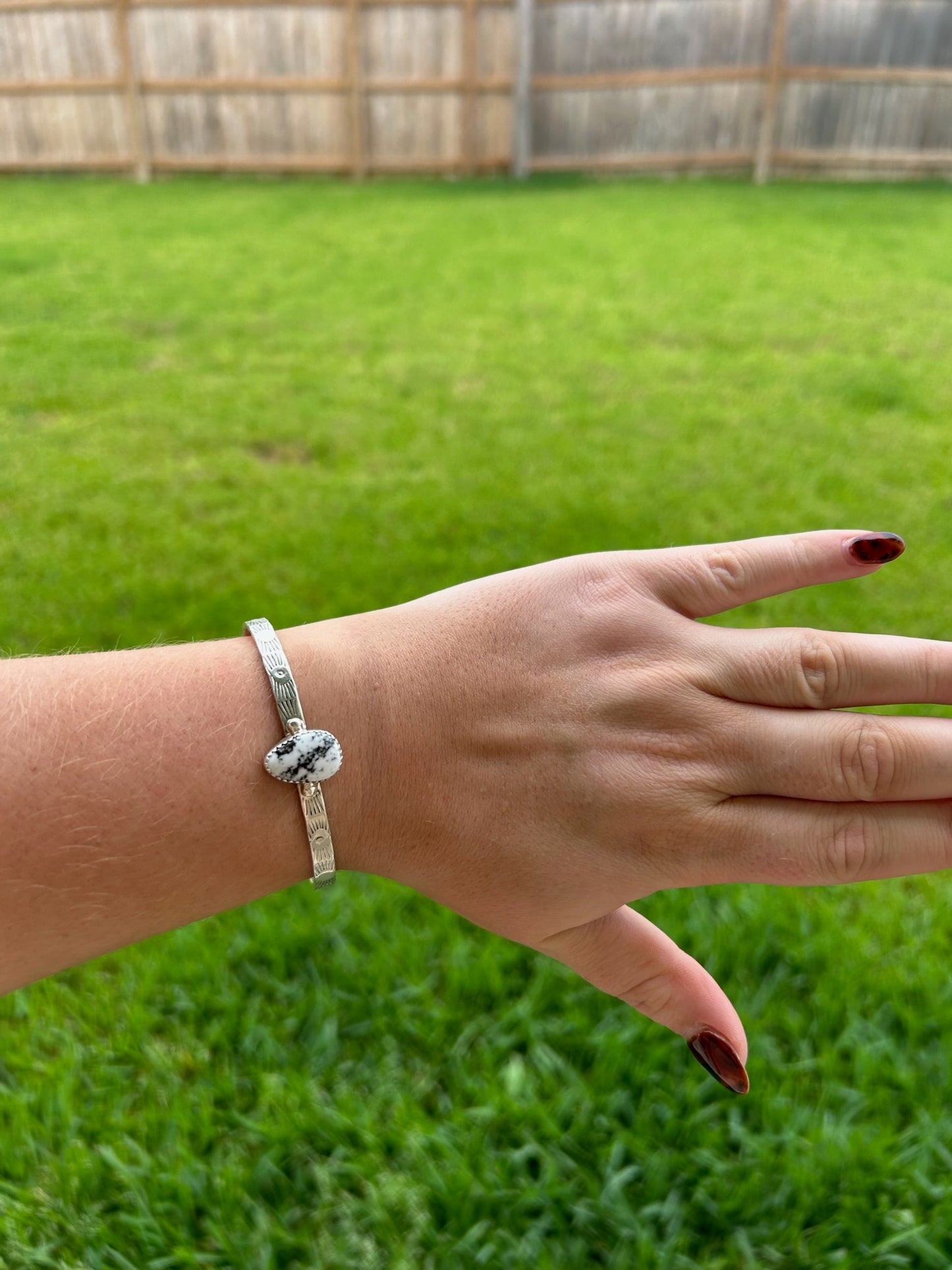 White Buffalo Oval Stamped Band Cuff