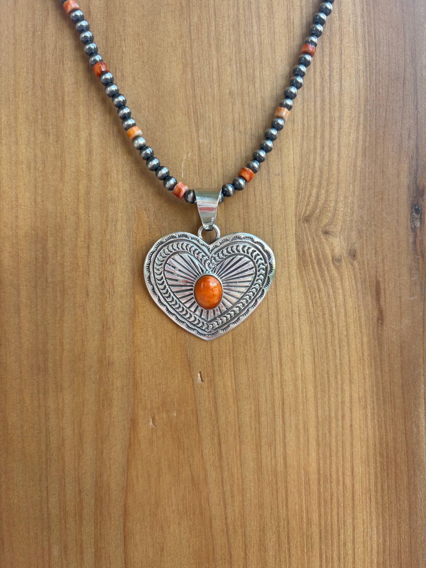 Orange Spiny Stamped Heart Pendant